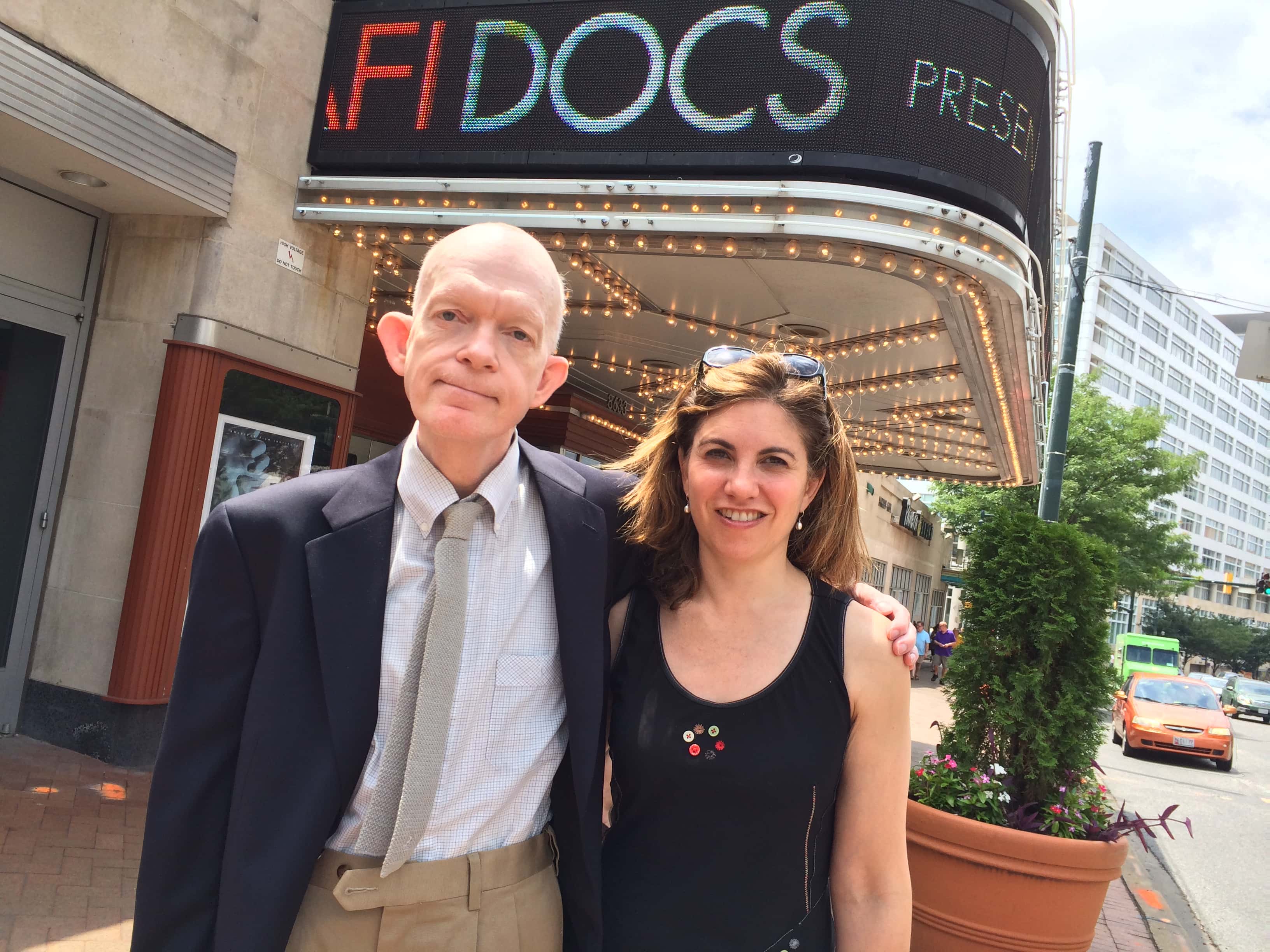 Photo of Mark Landis with a friend in front of movie marquee